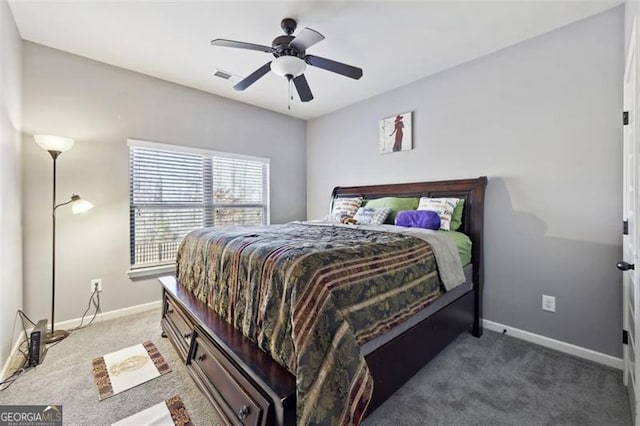 carpeted bedroom with ceiling fan