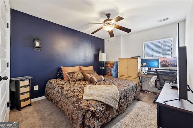 carpeted bedroom featuring ceiling fan