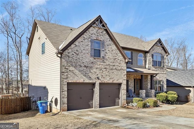 view of front of home featuring a garage and a porch