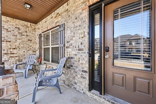 entrance to property with a porch