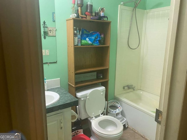 full bathroom with toilet, vanity, and  shower combination