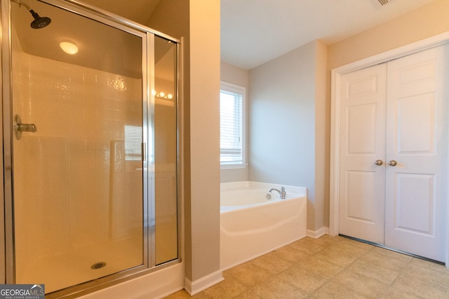 bathroom with independent shower and bath