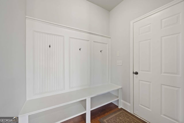 mudroom featuring dark wood-type flooring