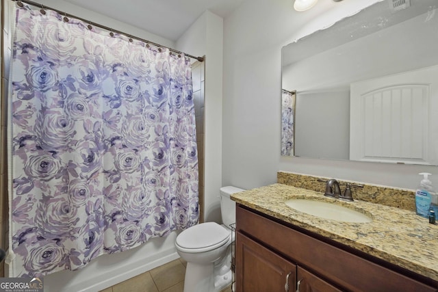 full bathroom with toilet, tile patterned floors, vanity, and shower / bath combo with shower curtain