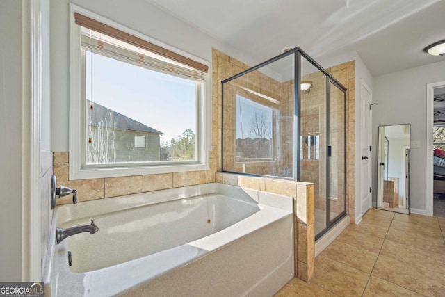 bathroom with tile patterned flooring and plus walk in shower