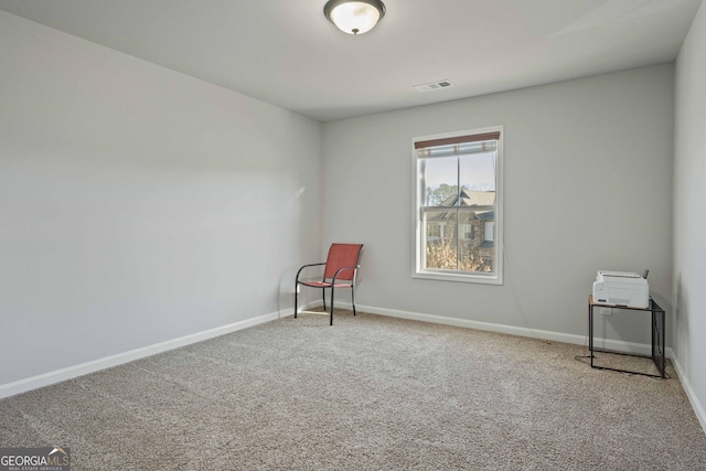 empty room with carpet flooring