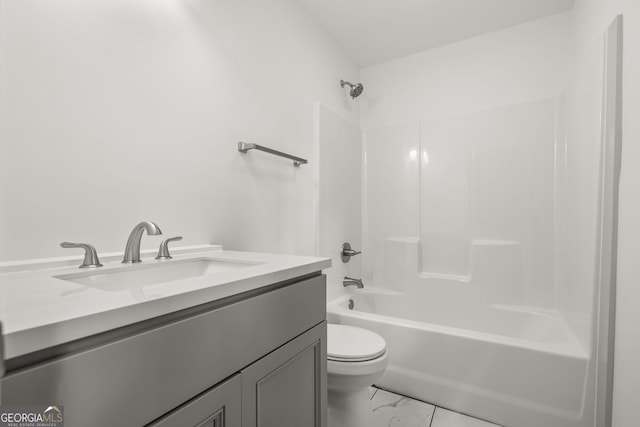 full bathroom featuring shower / washtub combination, vanity, and toilet