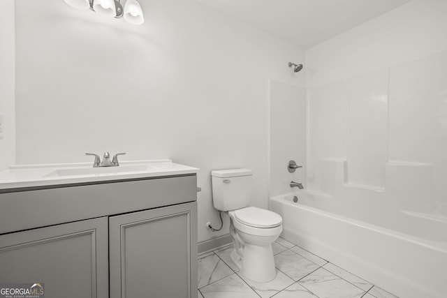 full bathroom featuring bathtub / shower combination, vanity, and toilet