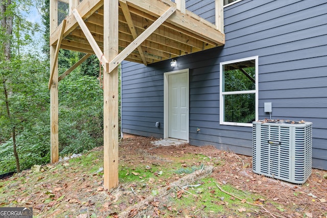 property entrance featuring central AC