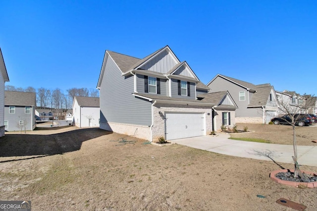 view of front of property with a garage and a front yard