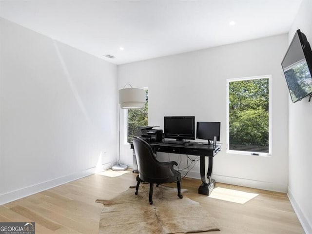 office space featuring light hardwood / wood-style floors