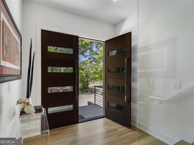 entryway with light hardwood / wood-style flooring