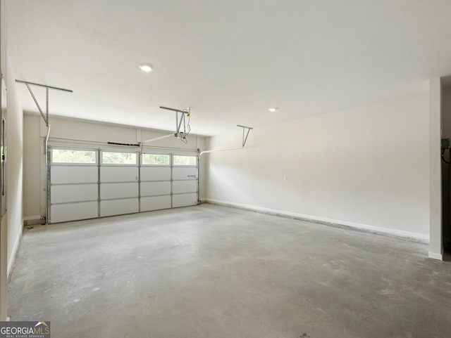 garage featuring baseboards