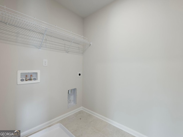 washroom featuring baseboards, laundry area, washer hookup, and hookup for an electric dryer