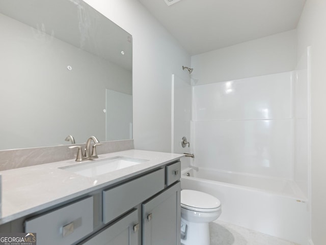 full bathroom featuring toilet, bathtub / shower combination, and vanity