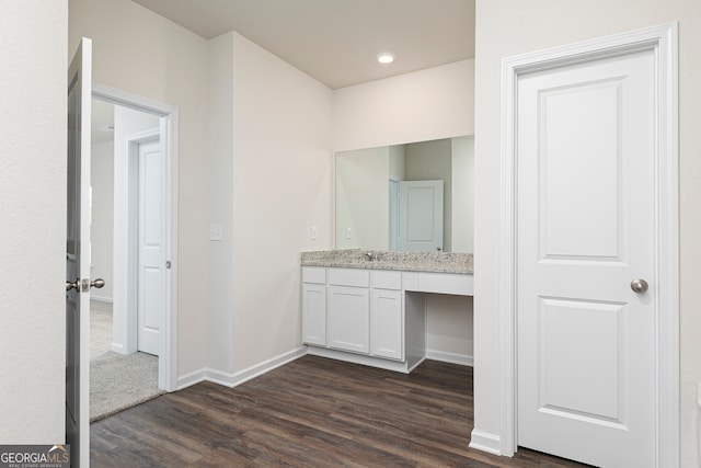 bathroom with vanity and hardwood / wood-style floors