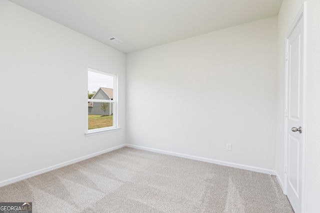 empty room with carpet floors