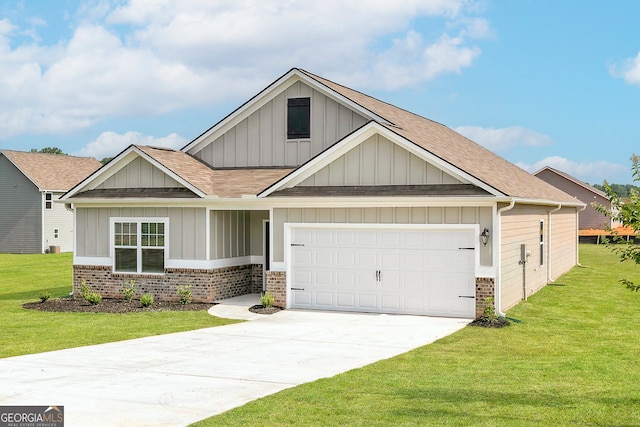 craftsman house with a front yard and a garage