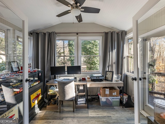 office with vaulted ceiling and wood-type flooring