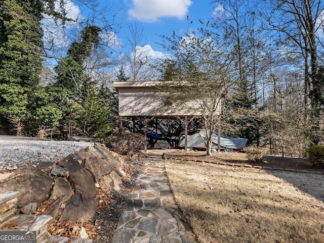 view of yard with a carport