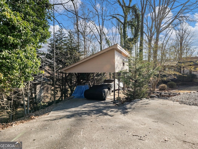 view of car parking with a carport