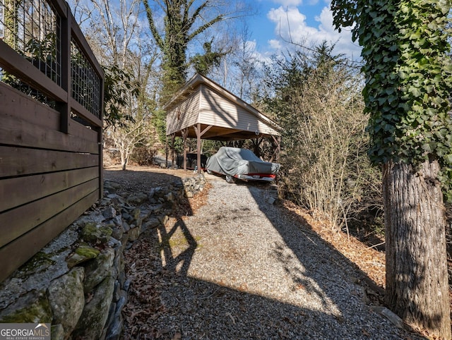 view of yard with a carport