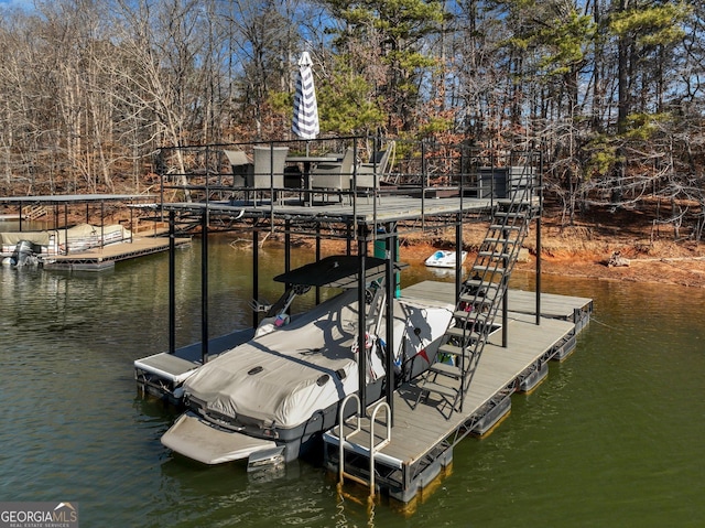 dock area with a water view