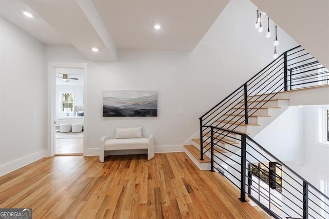 interior space featuring ceiling fan and hardwood / wood-style floors