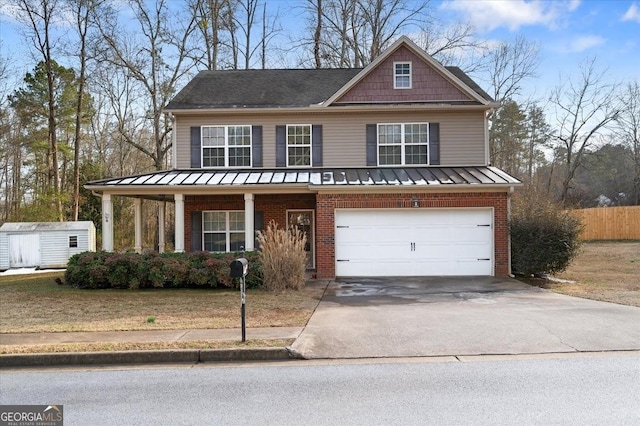 view of front of property with a porch and a garage