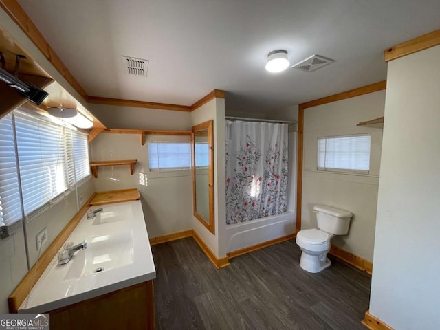 bathroom with hardwood / wood-style floors, toilet, crown molding, vanity, and curtained shower