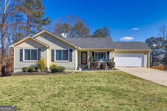 ranch-style house featuring covered porch, a front lawn, and a garage