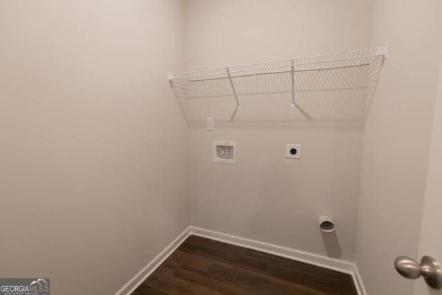 clothes washing area with washer hookup, dark hardwood / wood-style floors, and hookup for an electric dryer