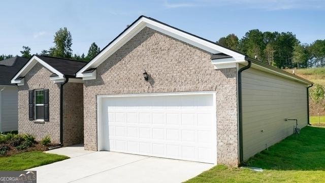 exterior space with a garage