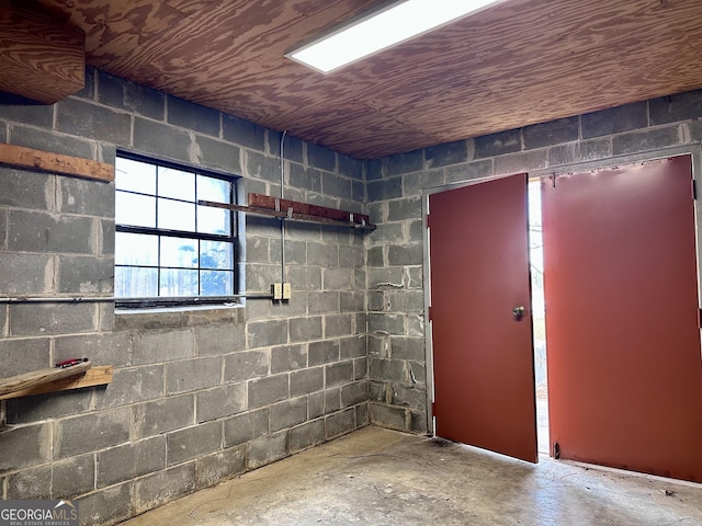 basement featuring wood ceiling