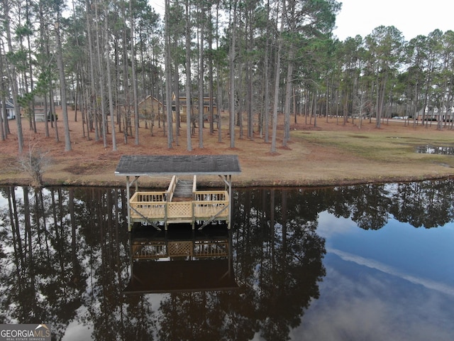 dock area featuring a water view