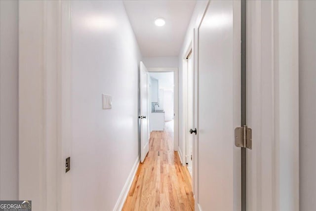 hallway featuring light wood-type flooring