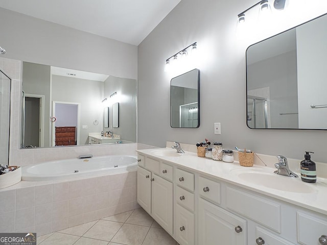 bathroom with vanity, shower with separate bathtub, and tile patterned flooring