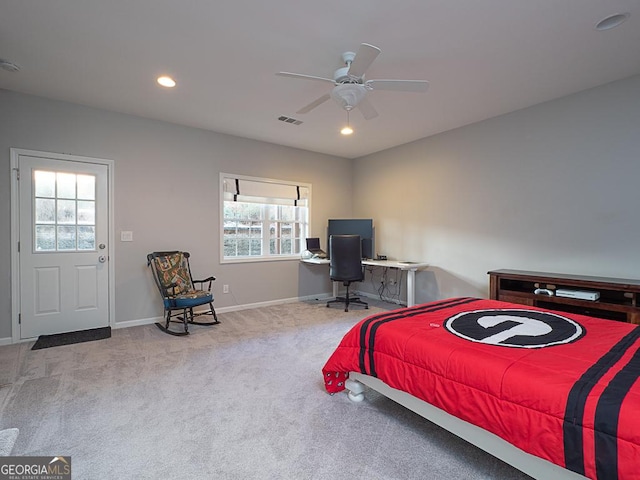 bedroom with light carpet and ceiling fan