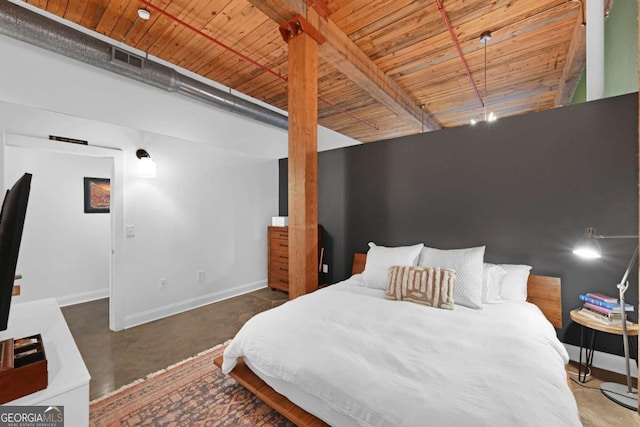 bedroom with wooden ceiling and concrete flooring