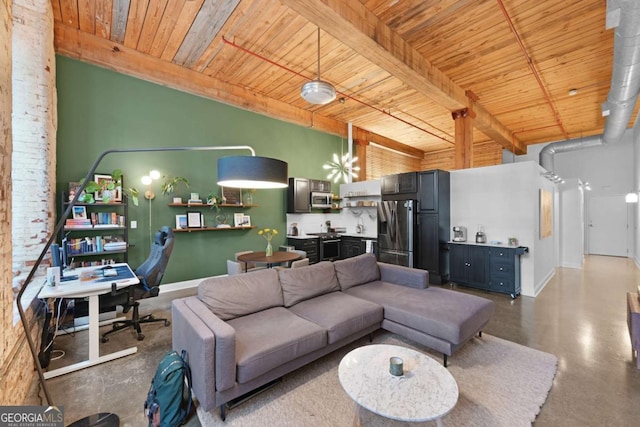 living room with wooden ceiling, a towering ceiling, and beamed ceiling