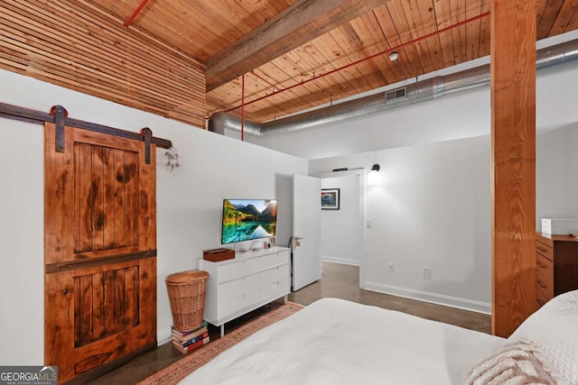 bedroom featuring wooden ceiling and a barn door