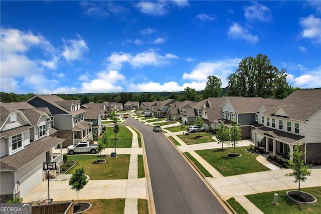 view of road featuring a residential view, sidewalks, and curbs