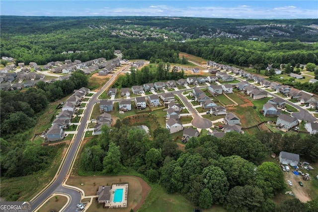 aerial view with a residential view and a forest view