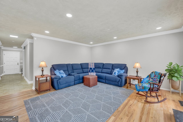 living room with a textured ceiling, crown molding, and wood-type flooring