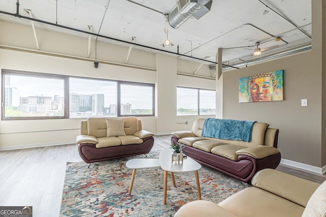 living room with wood-type flooring