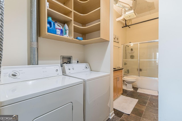 laundry area featuring washer and clothes dryer