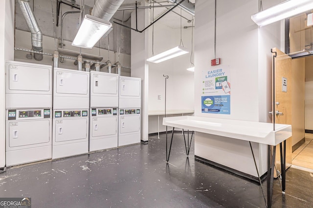 interior space with stacked washing maching and dryer