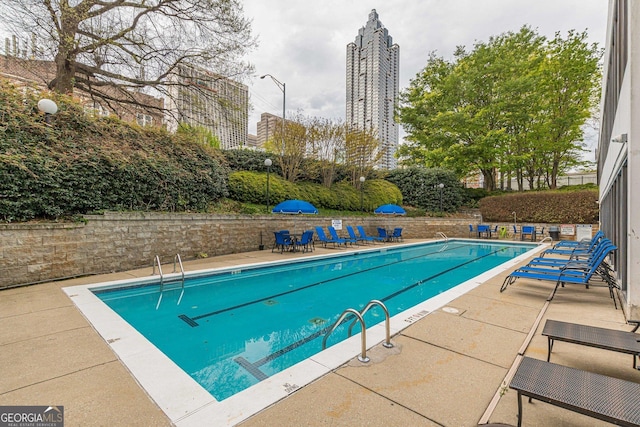 view of pool with a patio area