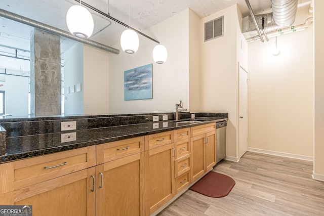 bathroom featuring hardwood / wood-style flooring and vanity