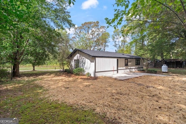 rear view of house with a patio area